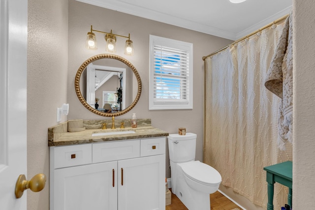 bathroom with crown molding, walk in shower, vanity, and toilet