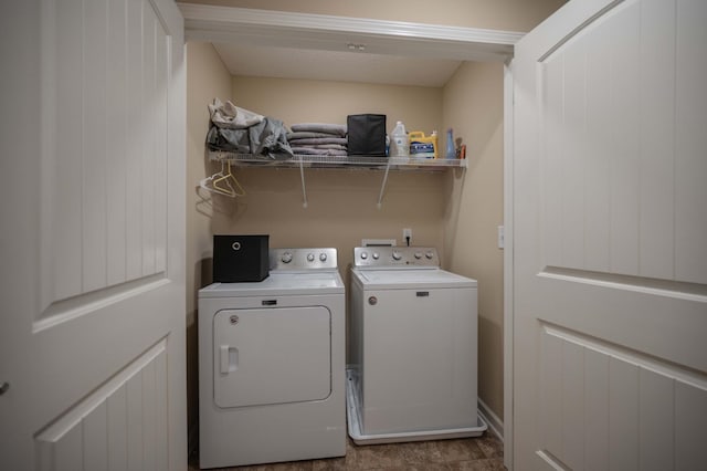 washroom with washing machine and dryer