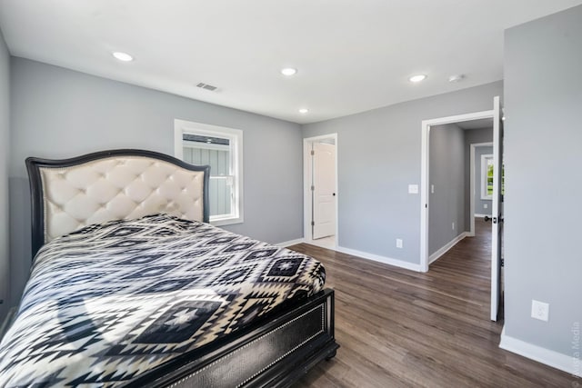 bedroom featuring dark hardwood / wood-style floors