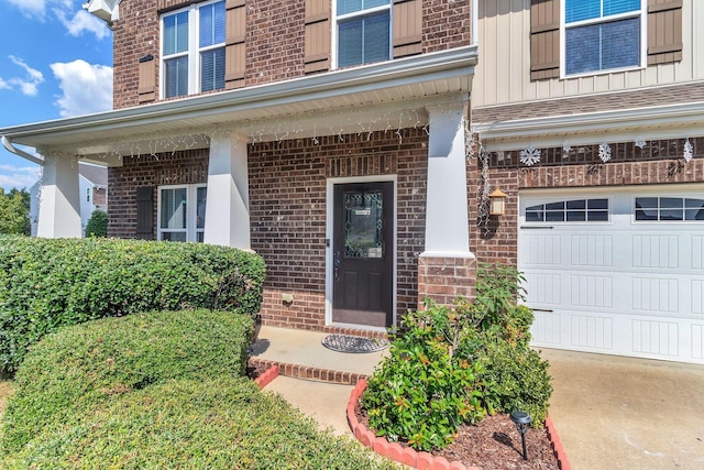 doorway to property featuring a garage