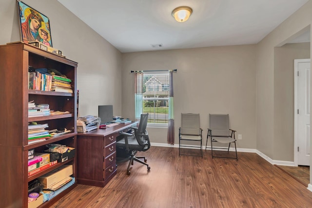 office with hardwood / wood-style flooring