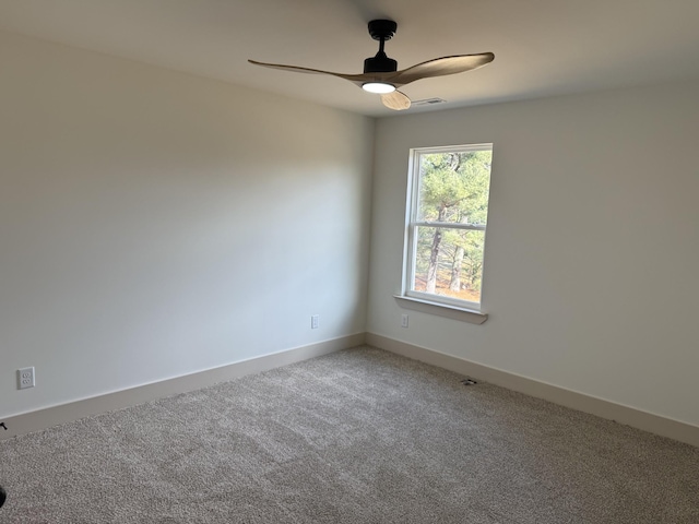 carpeted empty room with ceiling fan