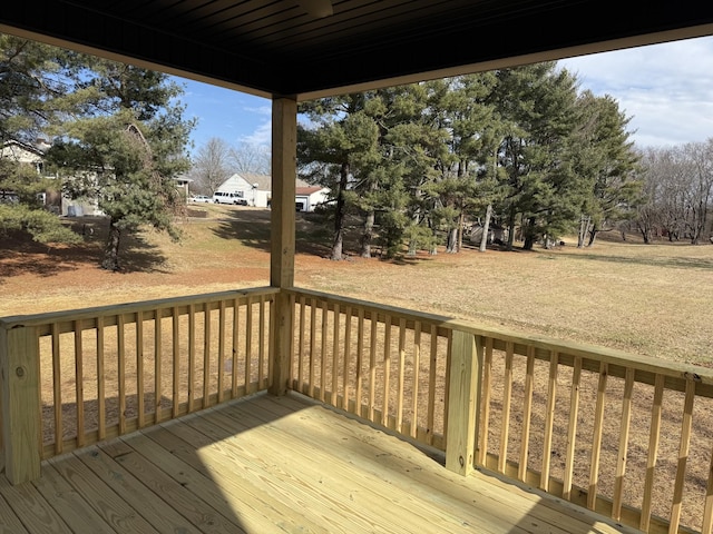 deck featuring a lawn