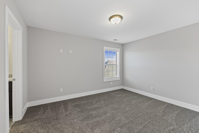 empty room with carpet floors