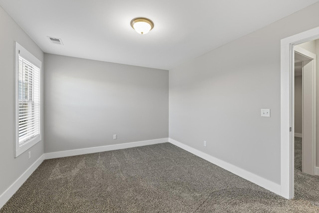 view of carpeted spare room