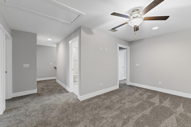 carpeted empty room featuring ceiling fan