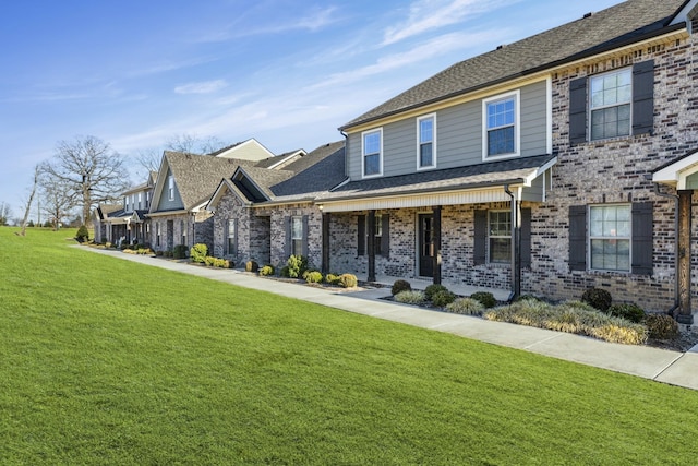 view of front of house with a front lawn