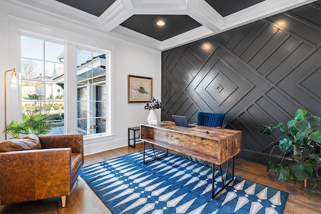 home office featuring ornamental molding, wood-type flooring, coffered ceiling, and beam ceiling