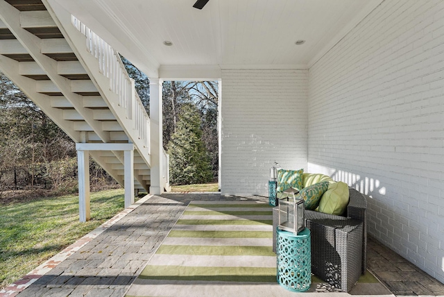 view of patio featuring ceiling fan