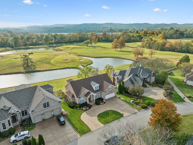 aerial view with a water view and golf course view