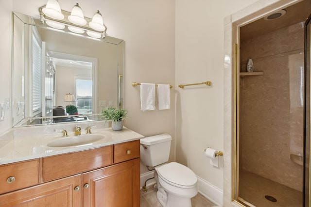 bathroom featuring walk in shower, vanity, toilet, and tile patterned flooring