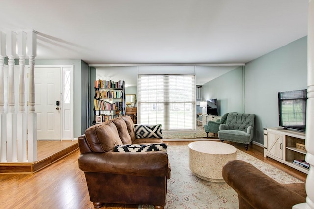 living room with light hardwood / wood-style floors