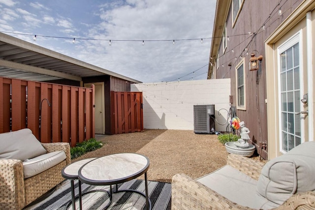 view of patio featuring central AC