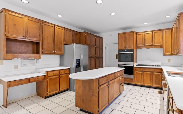 kitchen featuring appliances with stainless steel finishes and a center island