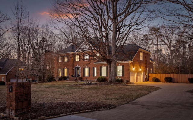 colonial-style house featuring a garage