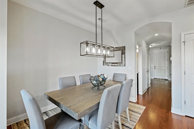 dining area featuring dark hardwood / wood-style flooring