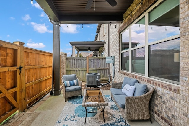 view of patio / terrace featuring outdoor lounge area, central AC, and ceiling fan