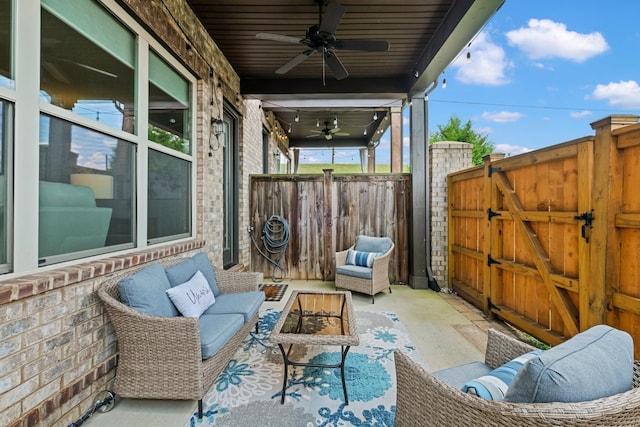 view of patio / terrace featuring ceiling fan and an outdoor hangout area