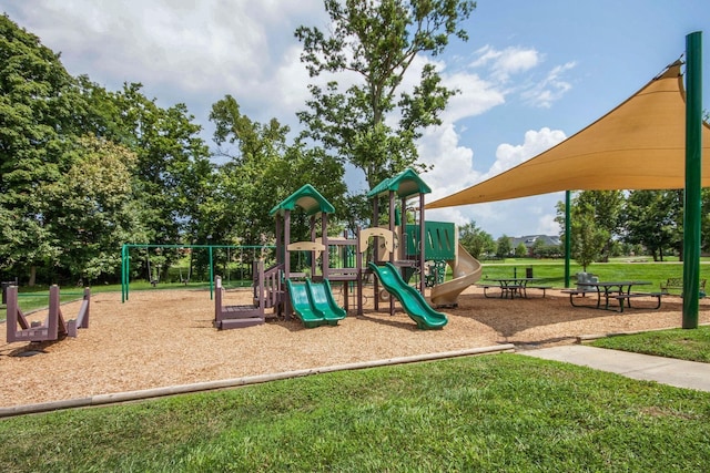 view of playground with a yard