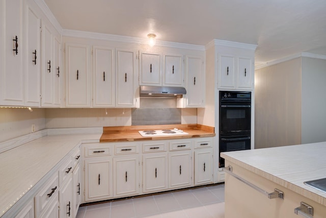 kitchen featuring backsplash, black double oven, white cooktop, and white cabinets