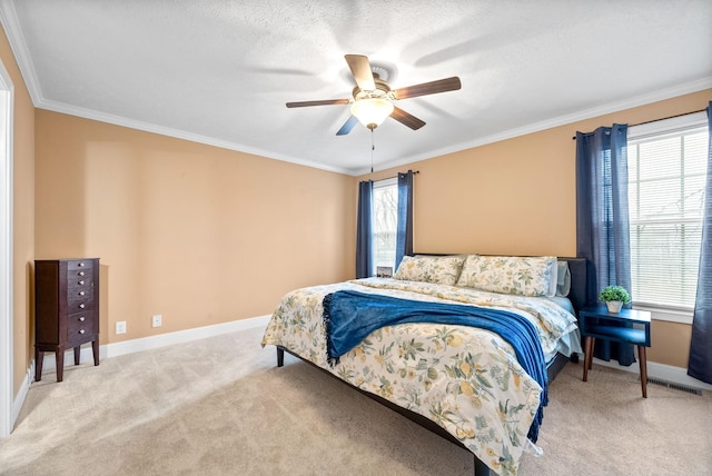 bedroom with light carpet, crown molding, multiple windows, and ceiling fan