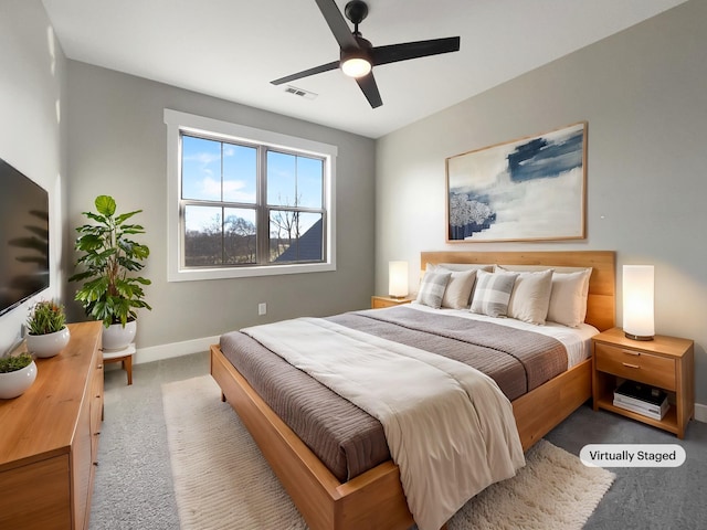 carpeted bedroom featuring ceiling fan