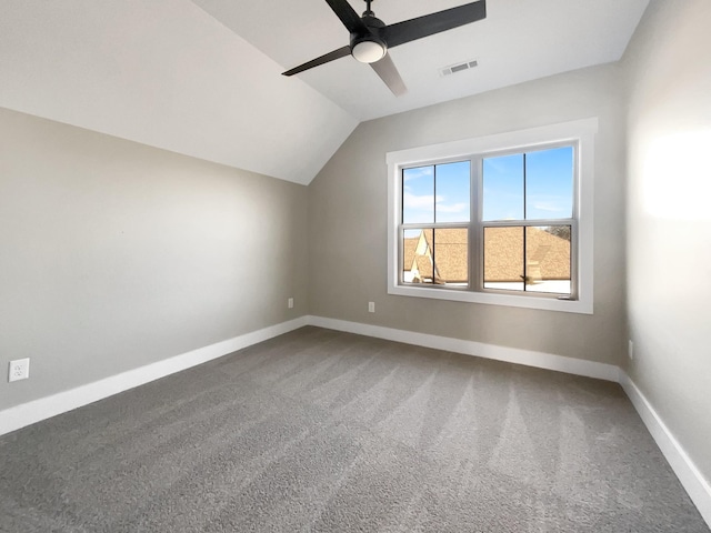 bonus room with ceiling fan, carpet flooring, and vaulted ceiling