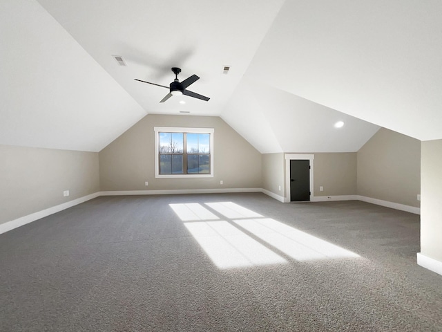 bonus room featuring lofted ceiling, ceiling fan, and carpet flooring