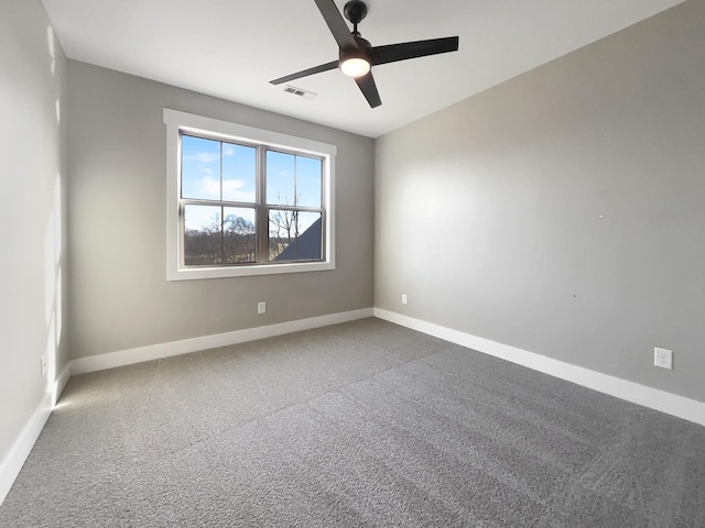 unfurnished room featuring carpet and ceiling fan