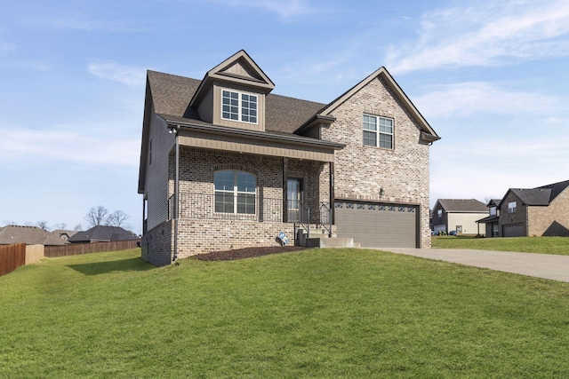 view of front of property with a garage and a front lawn