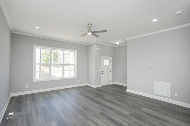 unfurnished room featuring crown molding, ceiling fan, and dark hardwood / wood-style floors