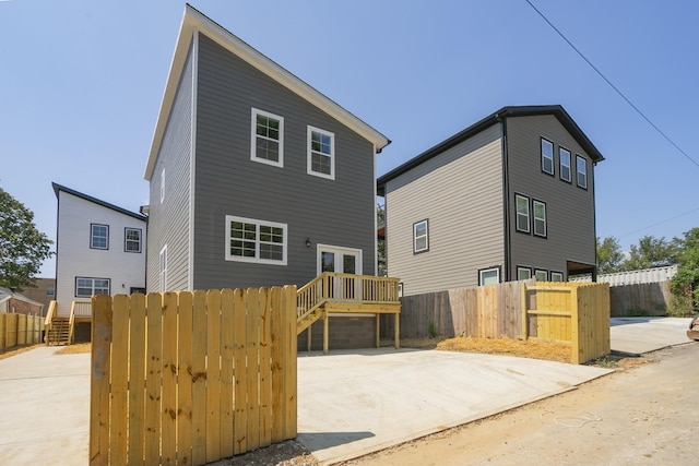 back of property featuring french doors