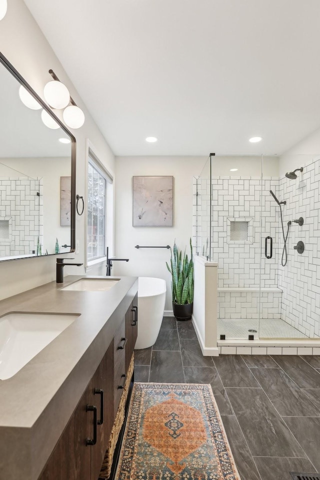 bathroom with vanity and plus walk in shower