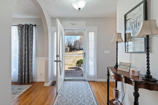 entrance foyer featuring light wood-type flooring