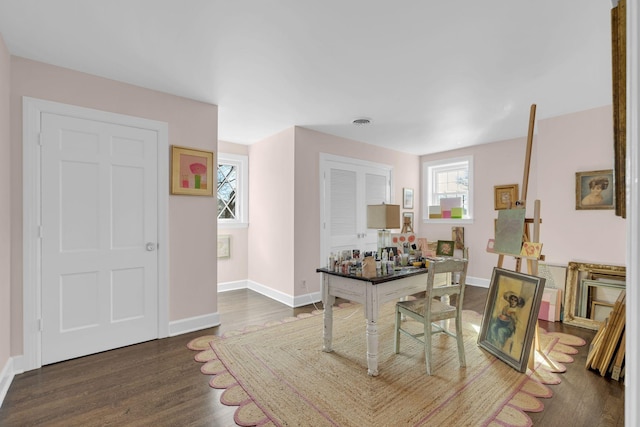 dining area with dark wood-type flooring