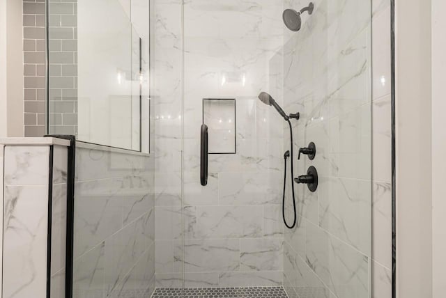 full bathroom featuring a shower stall