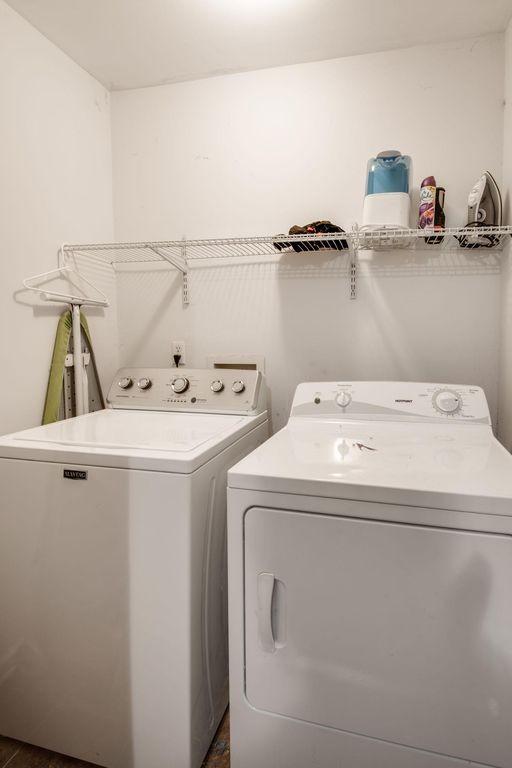 laundry room with washer and clothes dryer