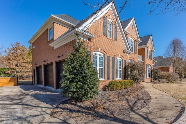 view of side of property featuring a garage