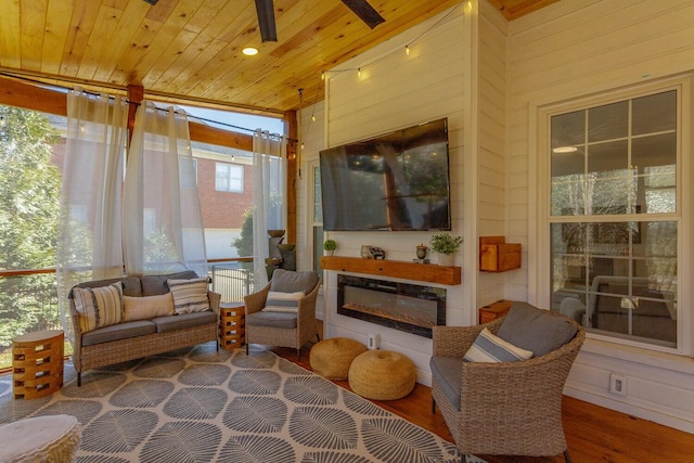 sunroom featuring wood ceiling