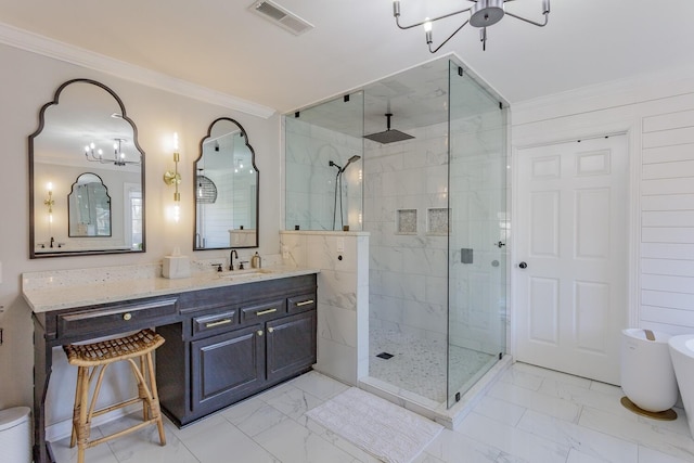 bathroom with ornamental molding, an enclosed shower, and vanity