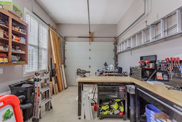 garage with a workshop area