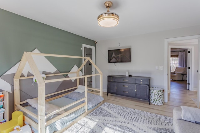 bedroom featuring light wood-type flooring