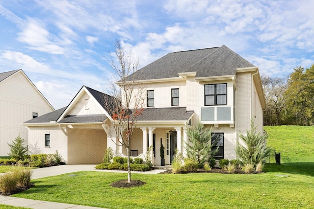 view of front of property featuring a porch and a front lawn