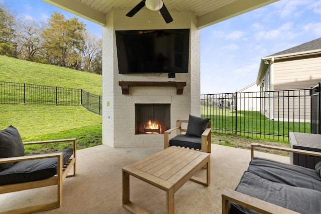 view of patio with an outdoor brick fireplace and ceiling fan