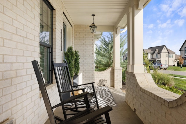 view of patio featuring a porch