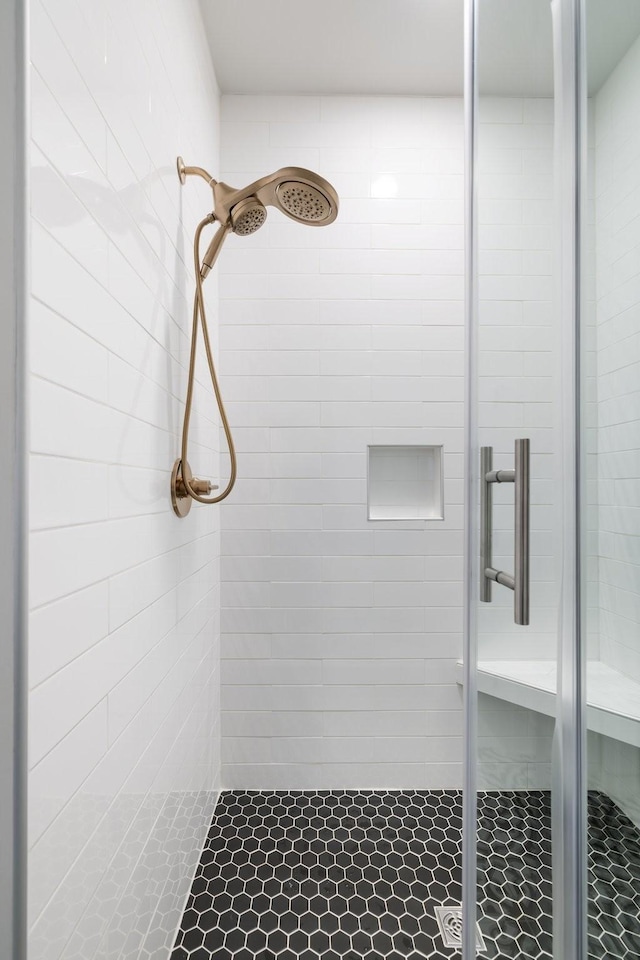 bathroom with a stall shower