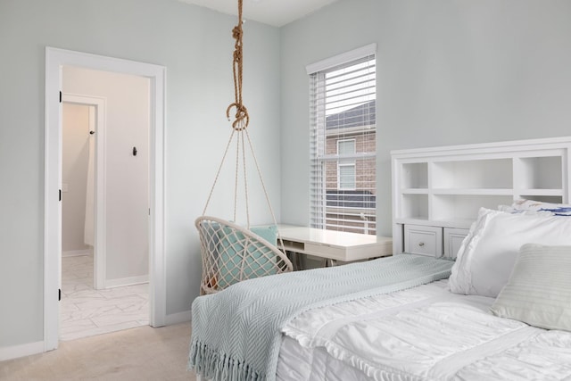 bedroom with marble finish floor and baseboards