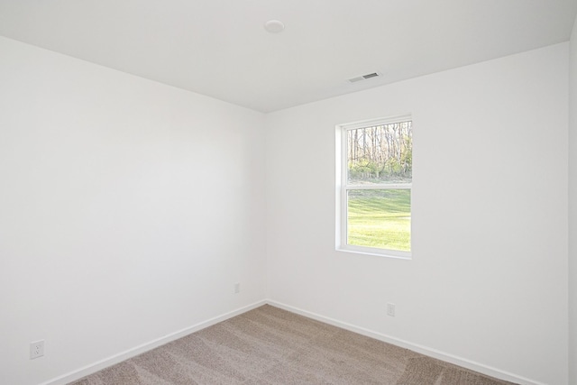 empty room featuring carpet floors