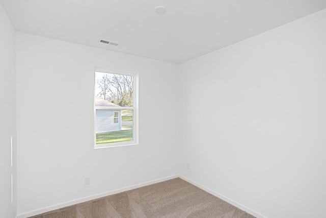 empty room featuring carpet floors