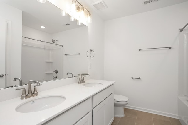 full bathroom with vanity, tile patterned flooring,  shower combination, and toilet